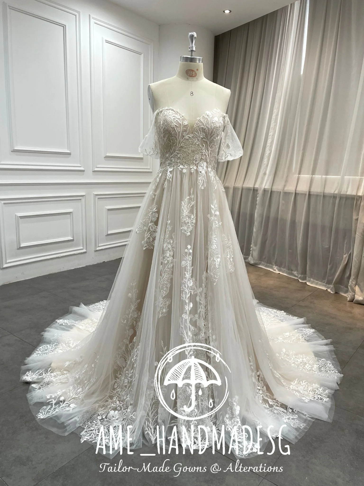 Ethereal Bloom — Off-Shoulder Lace A-Line Wedding Gown with Flowing Illusion Train